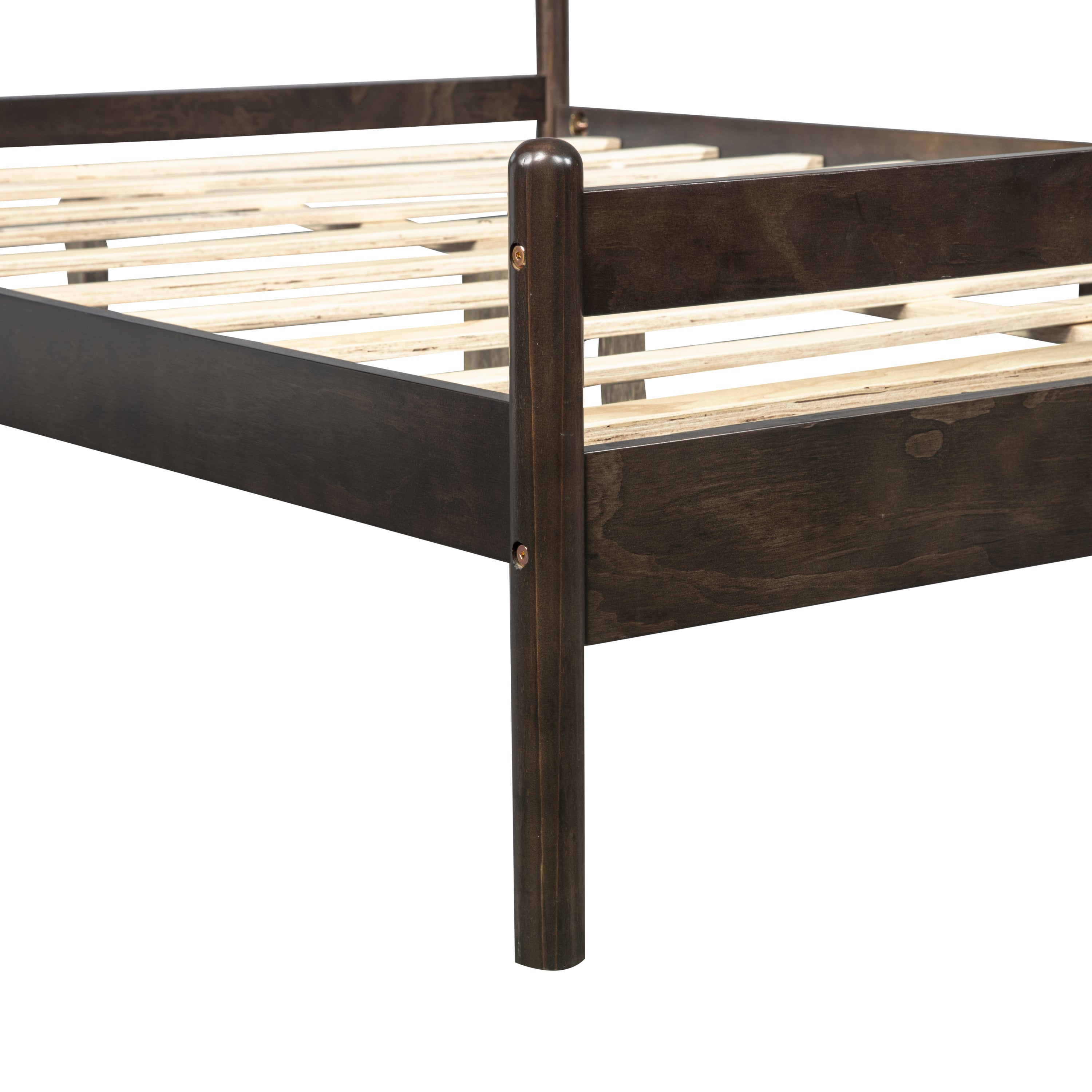 Close-up of the footboard corner post and wood slats on a dark brown pinewood queen bed #Color_Brown