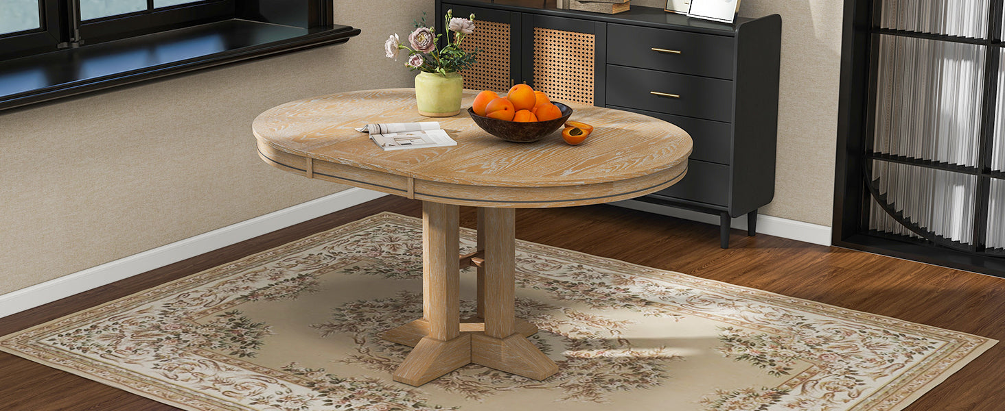 Natural oak round dining table styled near a window