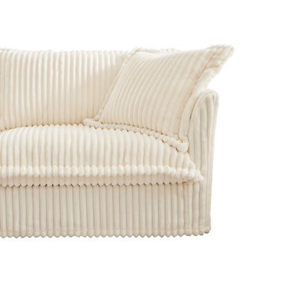End view of fluffy cream 4-seat corduroy sectional with ottoman, showcasing cozy pillow, ribbed texture, and plush armrest design.