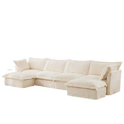 Studio angled view of a fluffy cream corduroy 4-seat sectional with two ottomans — featuring plush cushions, ribbed texture, and removable, machine washable slipcovers for a pet-friendly, modular couch ideal for modern spaces.