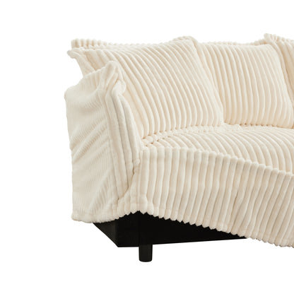 Close-up of fluffy cream sectional showing removable, machine washable slipcovers for easy cleaning and everyday functionality.