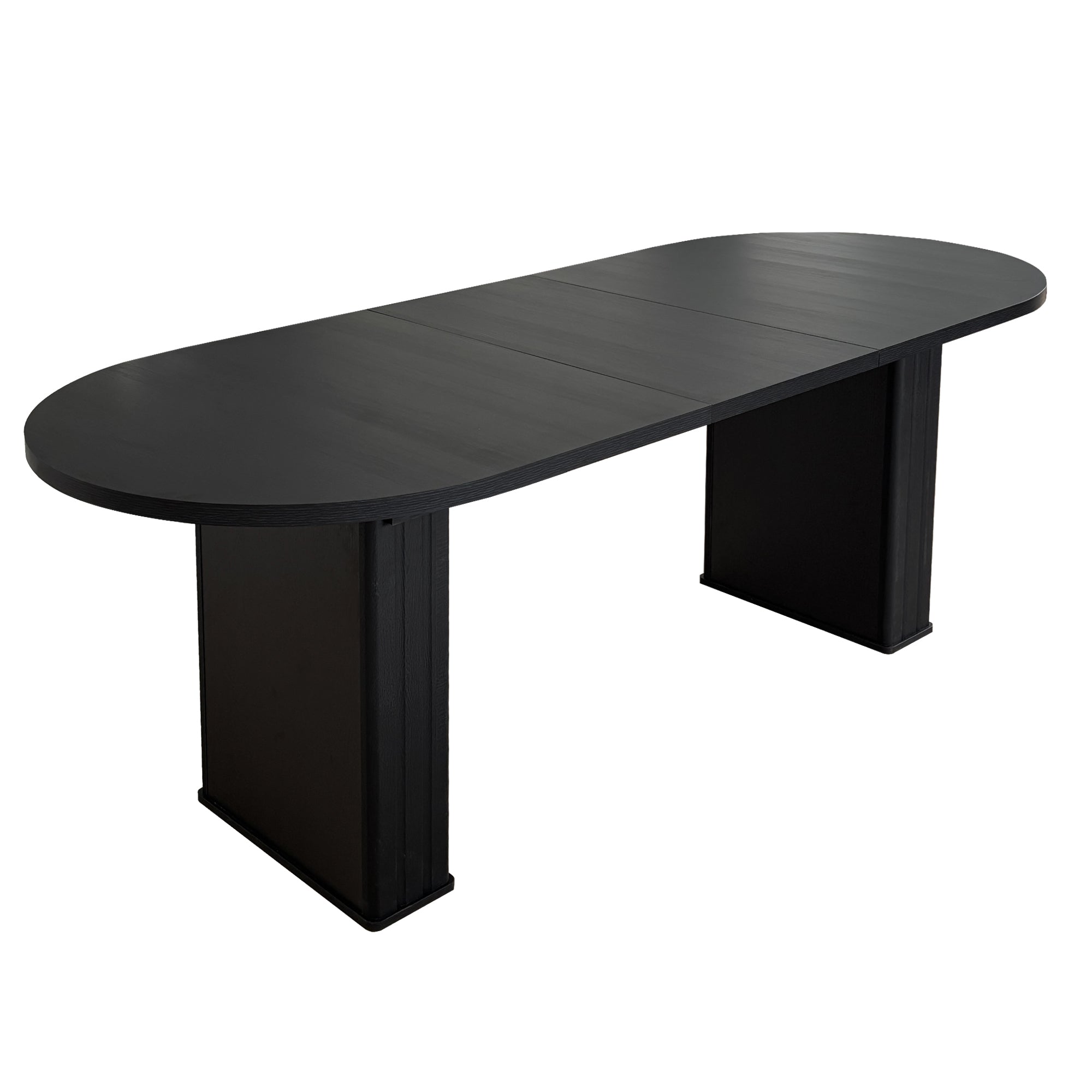 Opposite three-quarter studio view of the black oval extendable dining table, white background