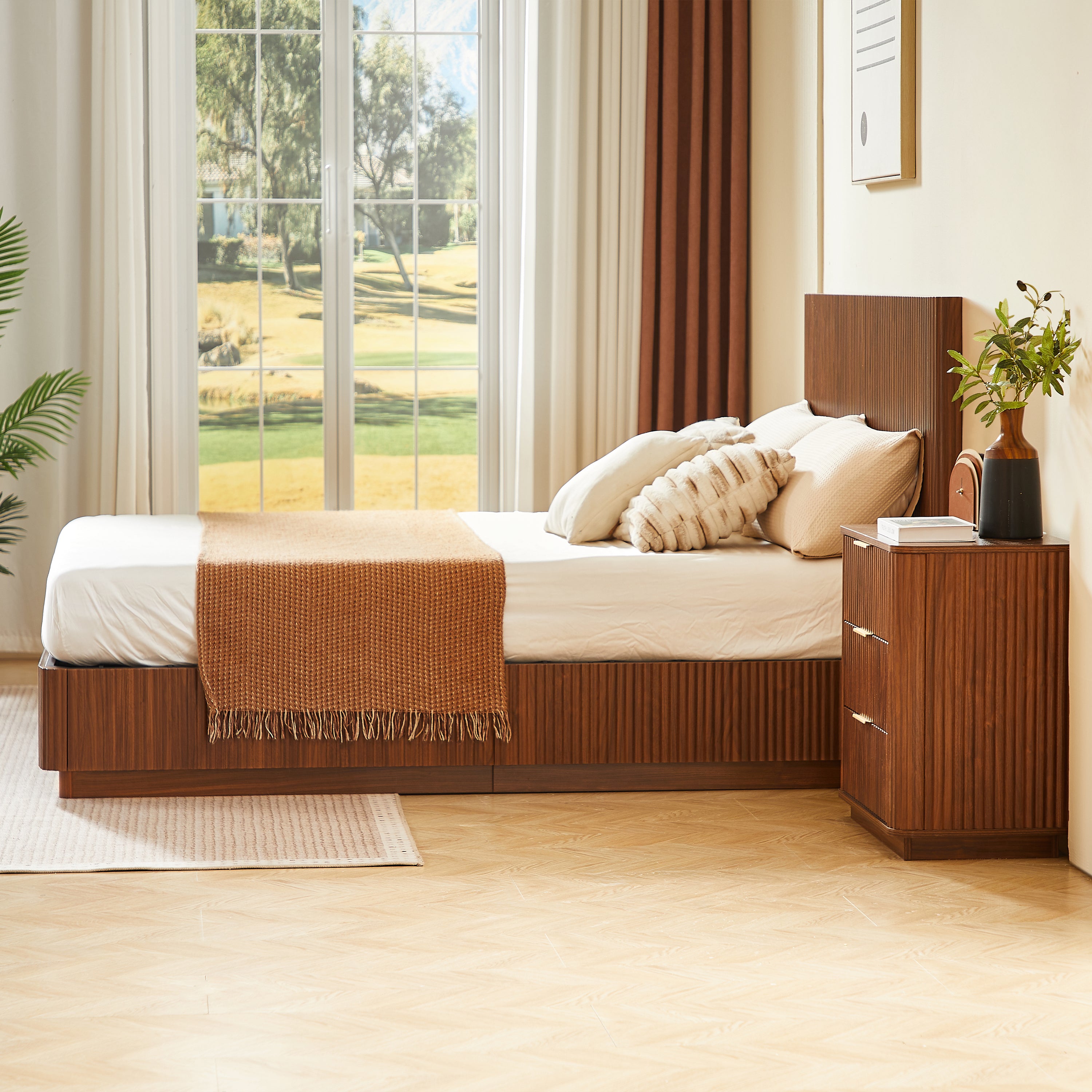 Side angle of the low walnut platform bed showing the corrugated base and vertical-groove headboard #Color_Walnut
