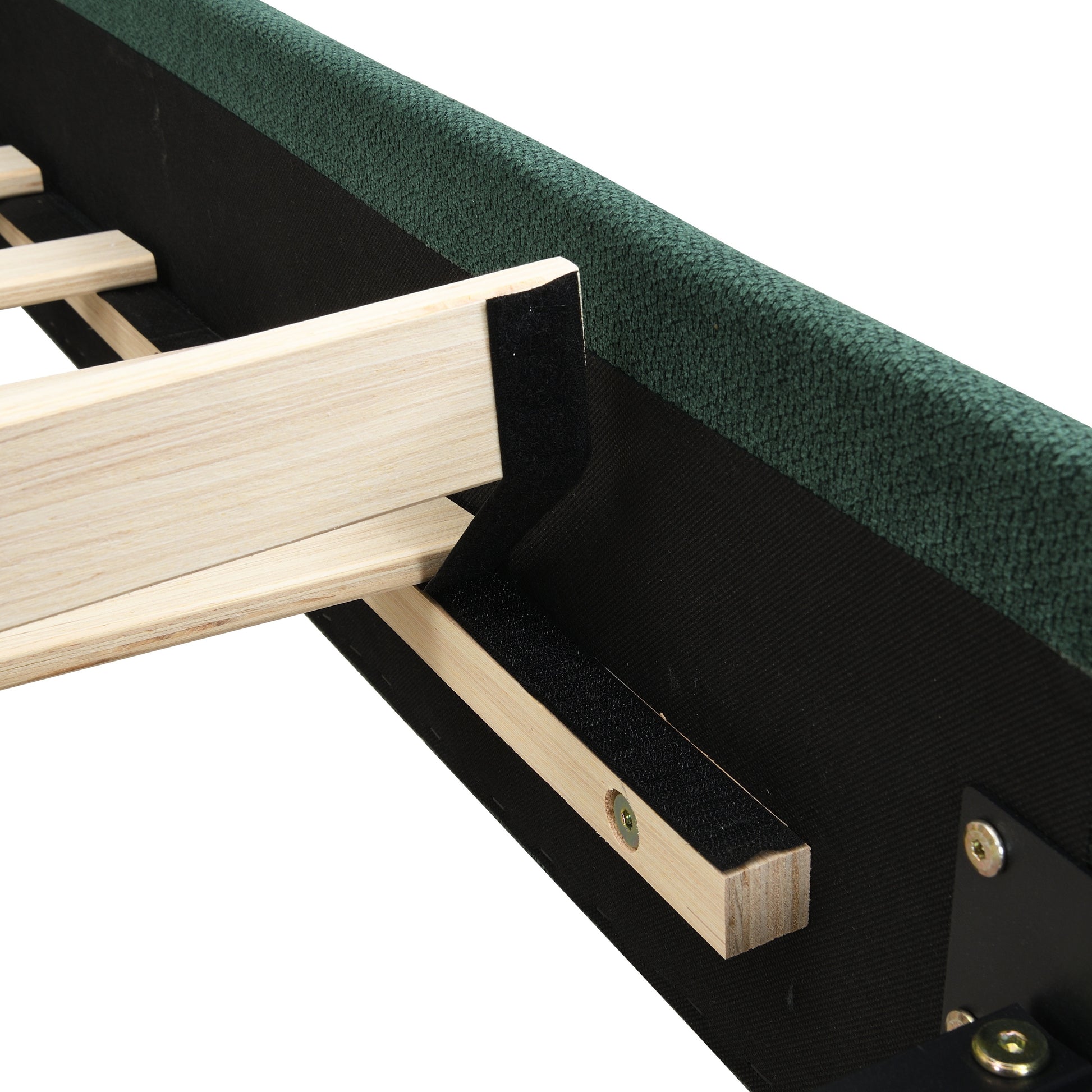 Close-up of slat-to-frame bracket connection on olive green bed frame