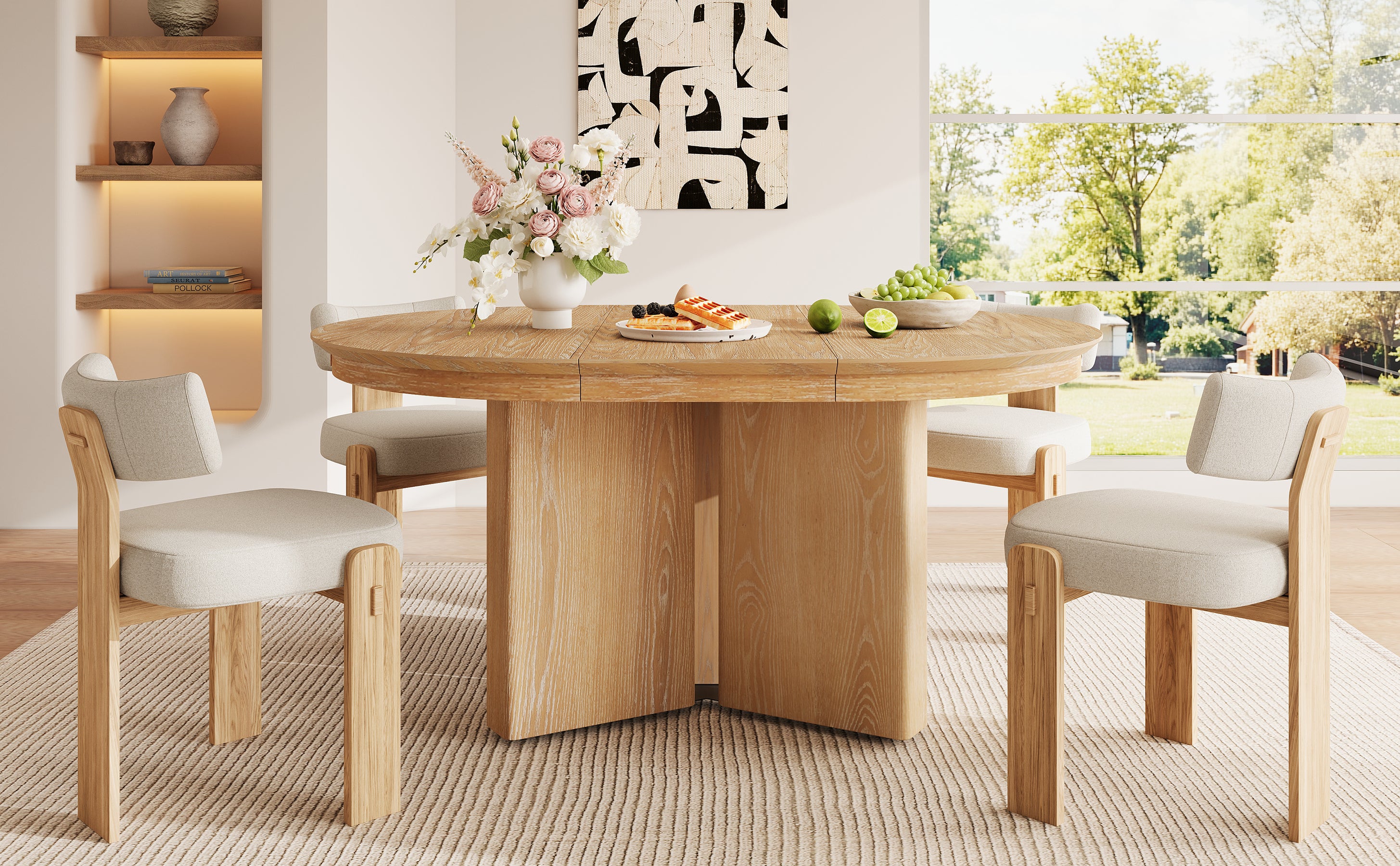 Extended oval natural oak table with four cream chairs and lit shelving