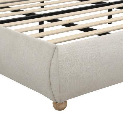 Beige chenille king bed frame in a neutral bedroom with pink and white bedding