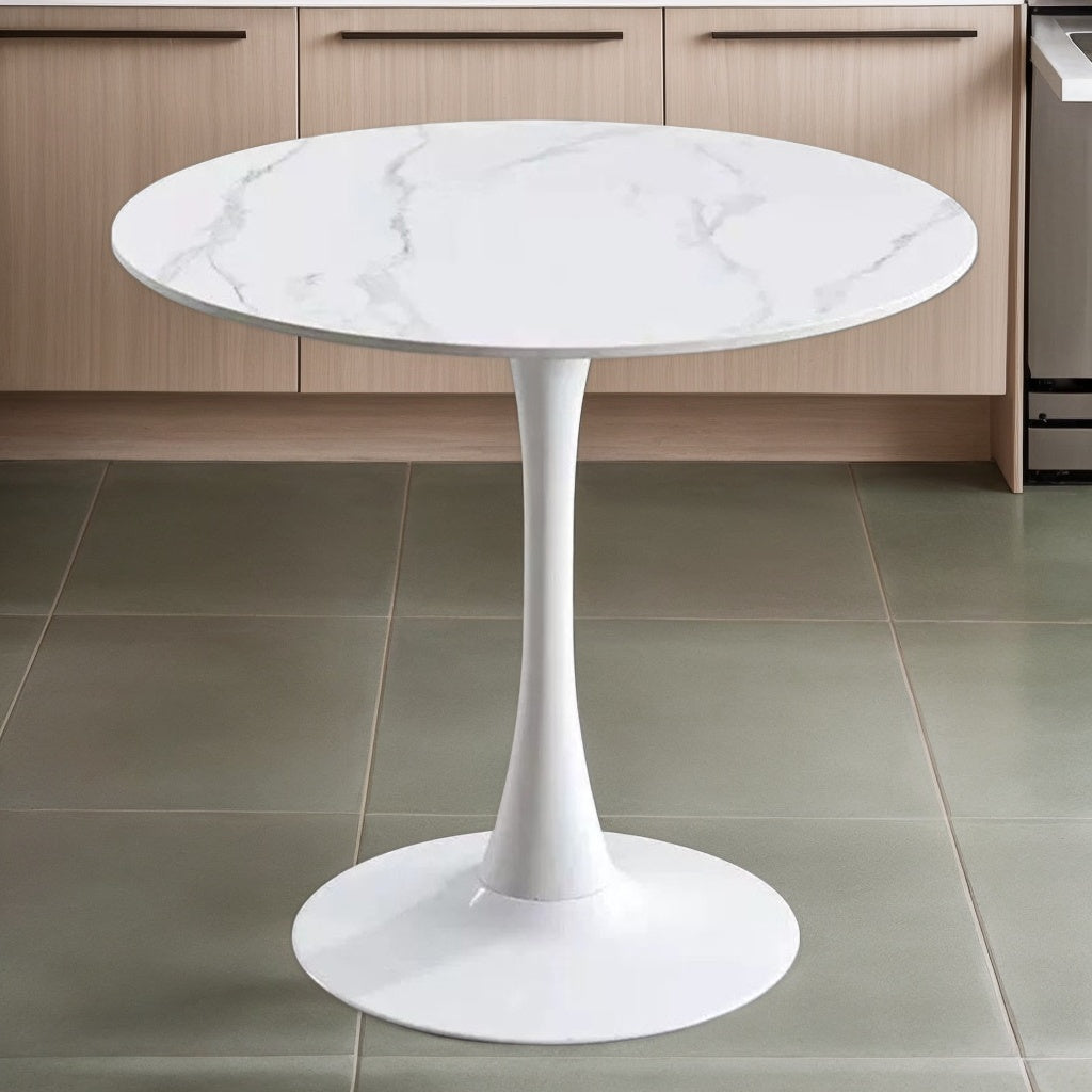 White marble tulip bistro table in a kitchen with green tile floor, front view