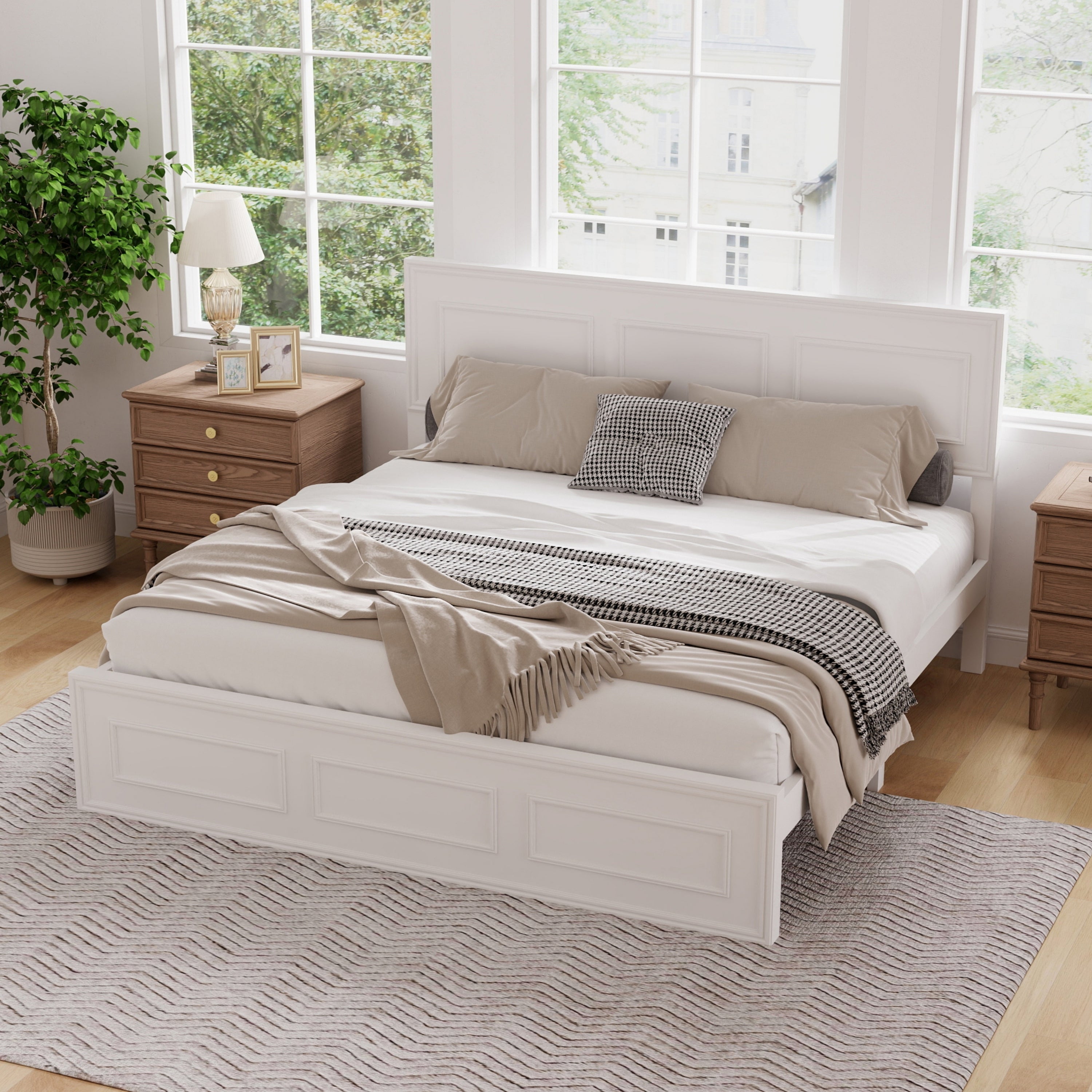 Angled view of the white panel queen bed frame with matching footboard, wood nightstand and lamp alongside #Color_White