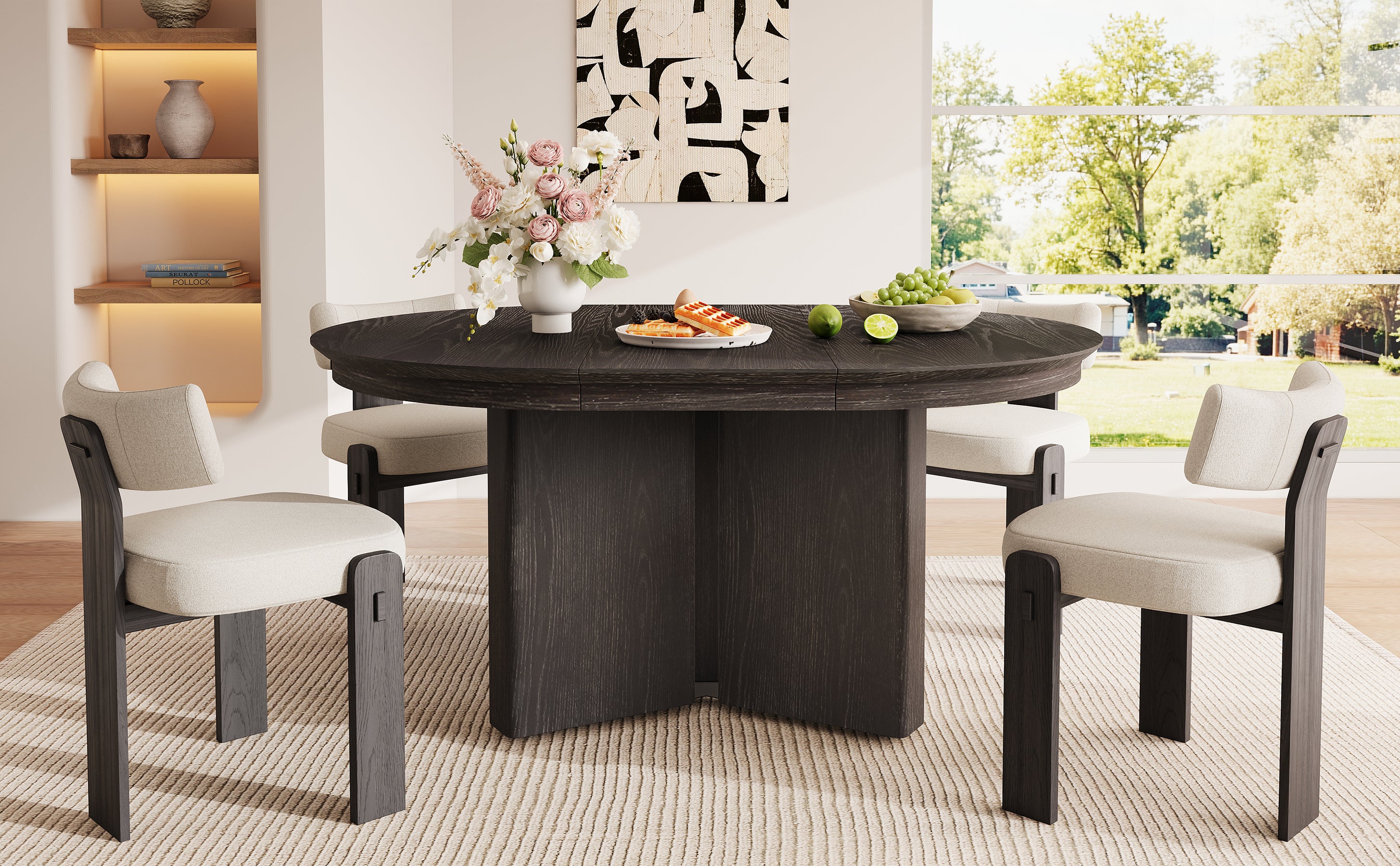 Round espresso table with four cream chairs near lit shelving and a window