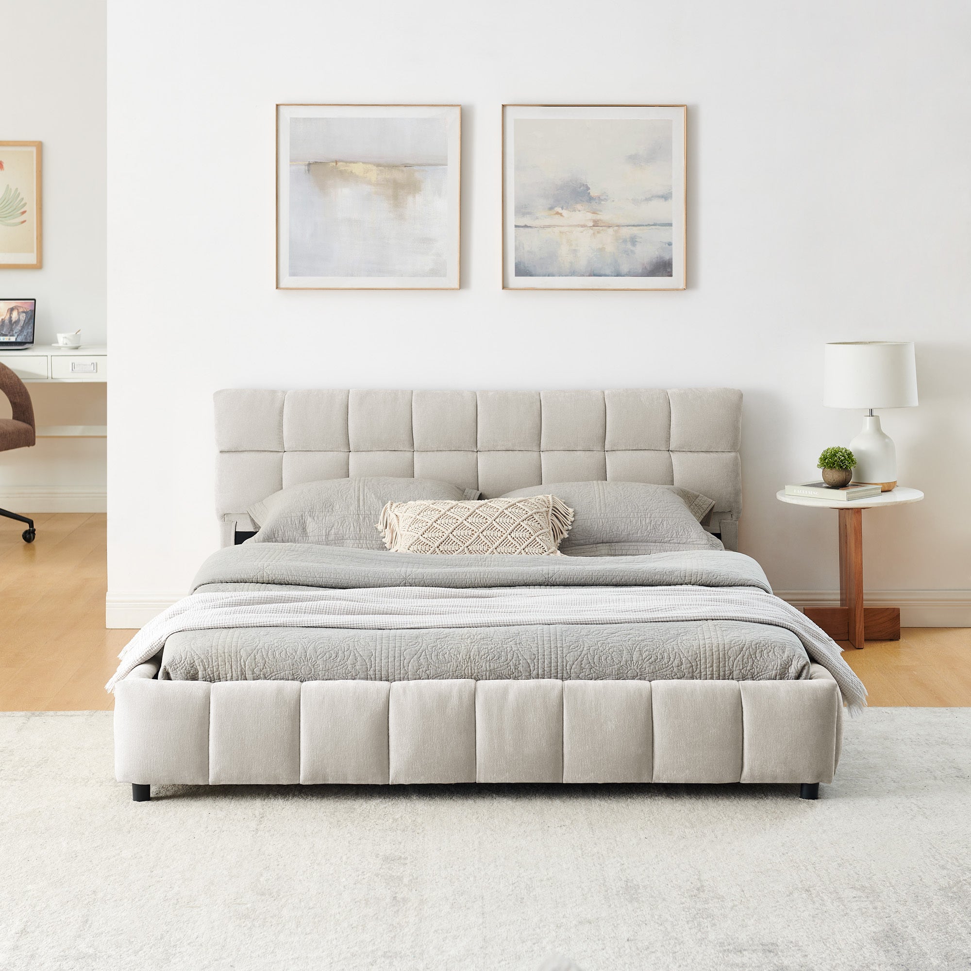 Front view of the beige chenille queen bed, grid-tufted headboard and channel-tufted footboard, gray bedding