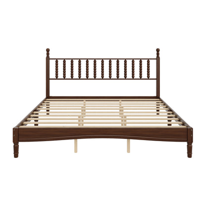 Front view of walnut king bed frame showing spindle headboard on white background