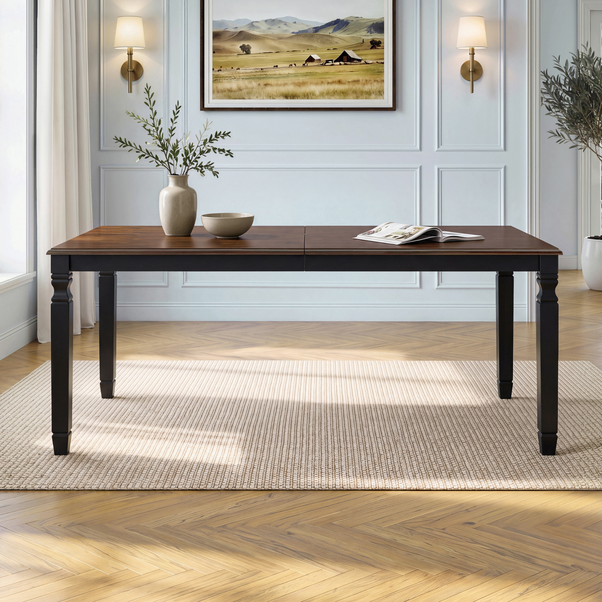 Espresso oak veneer farmhouse extendable dining table, front view in a styled dining room with wall sconces