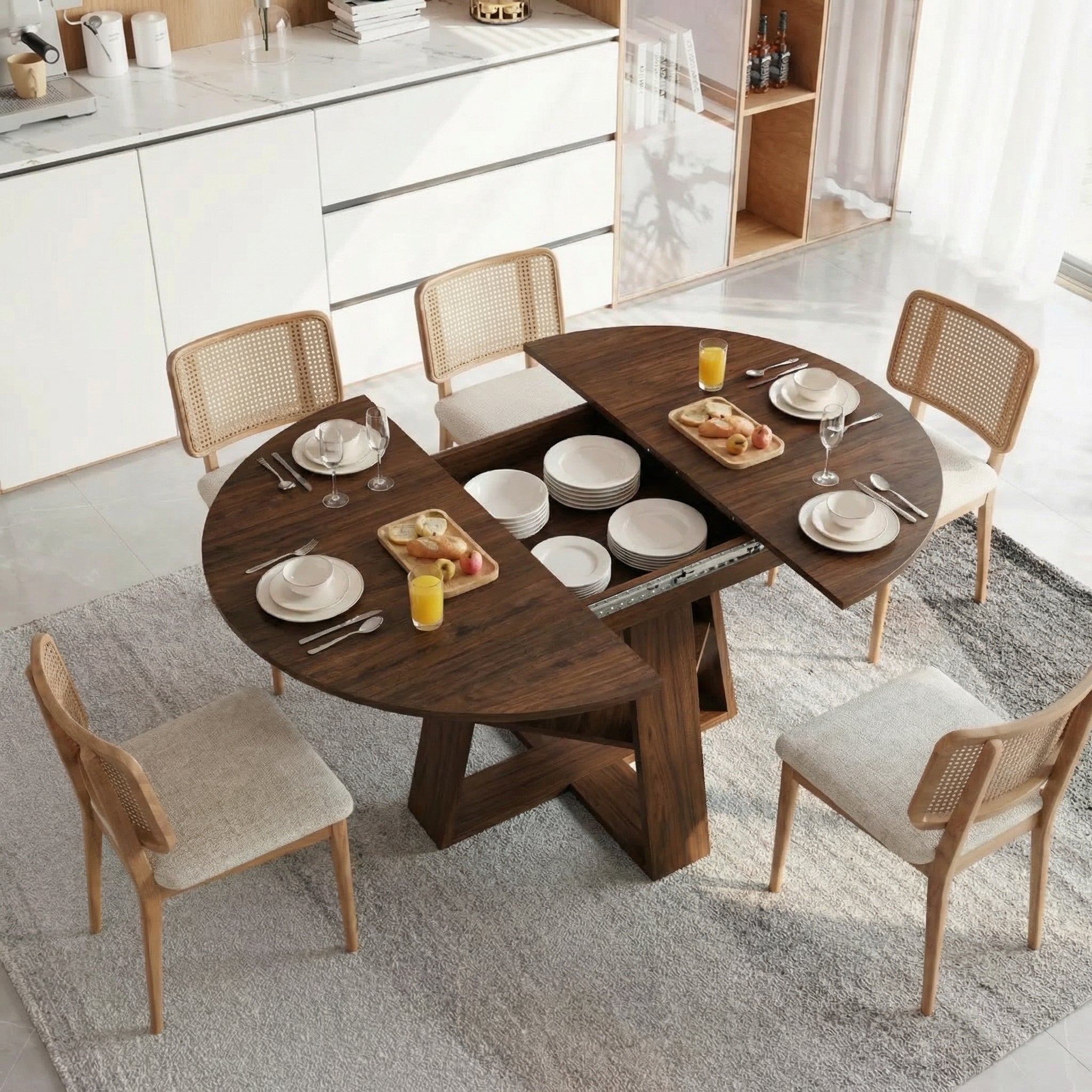 Overhead view of the table opened to reveal the hidden storage compartment with dishes