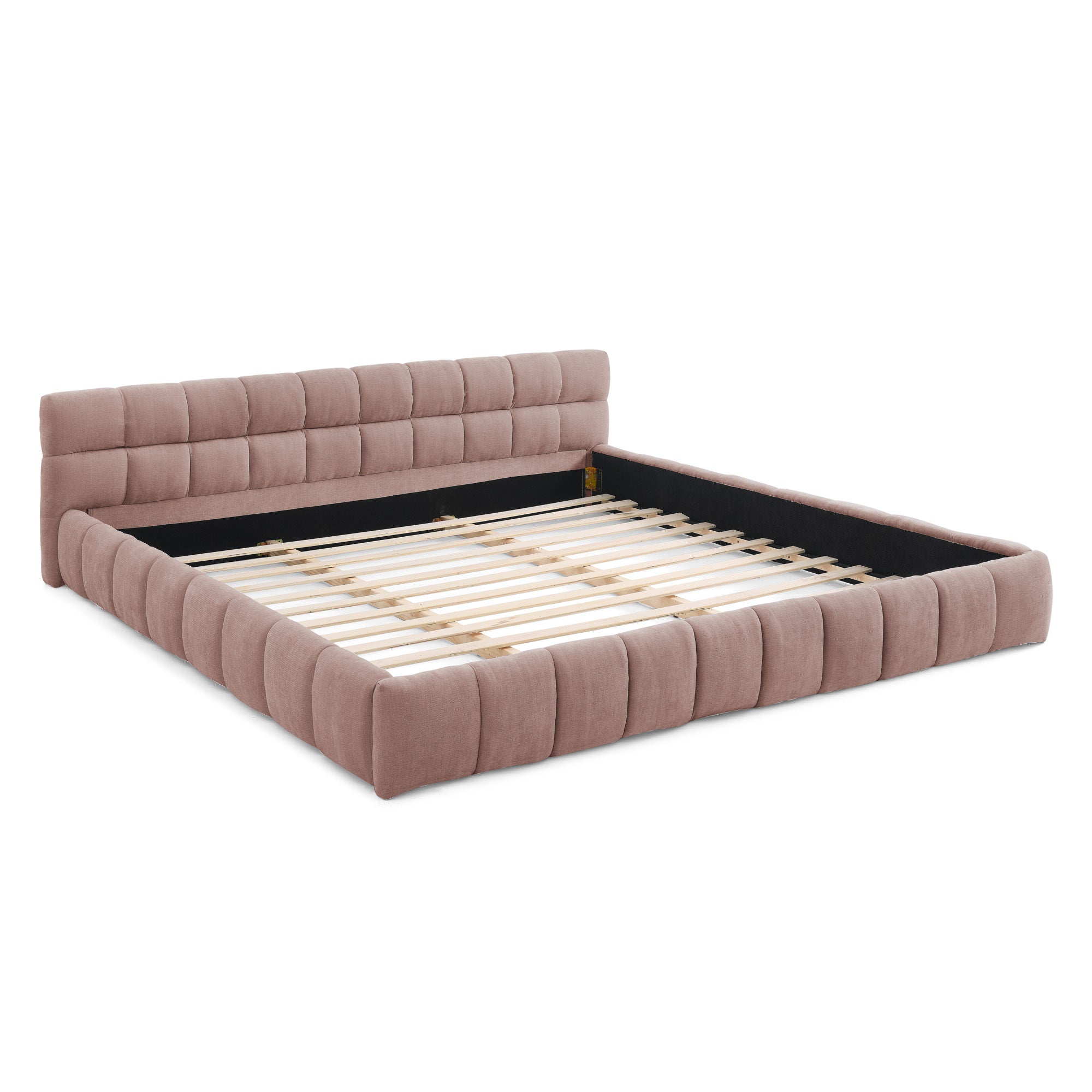 Pink chenille king bed frame on white background, three-quarter angle