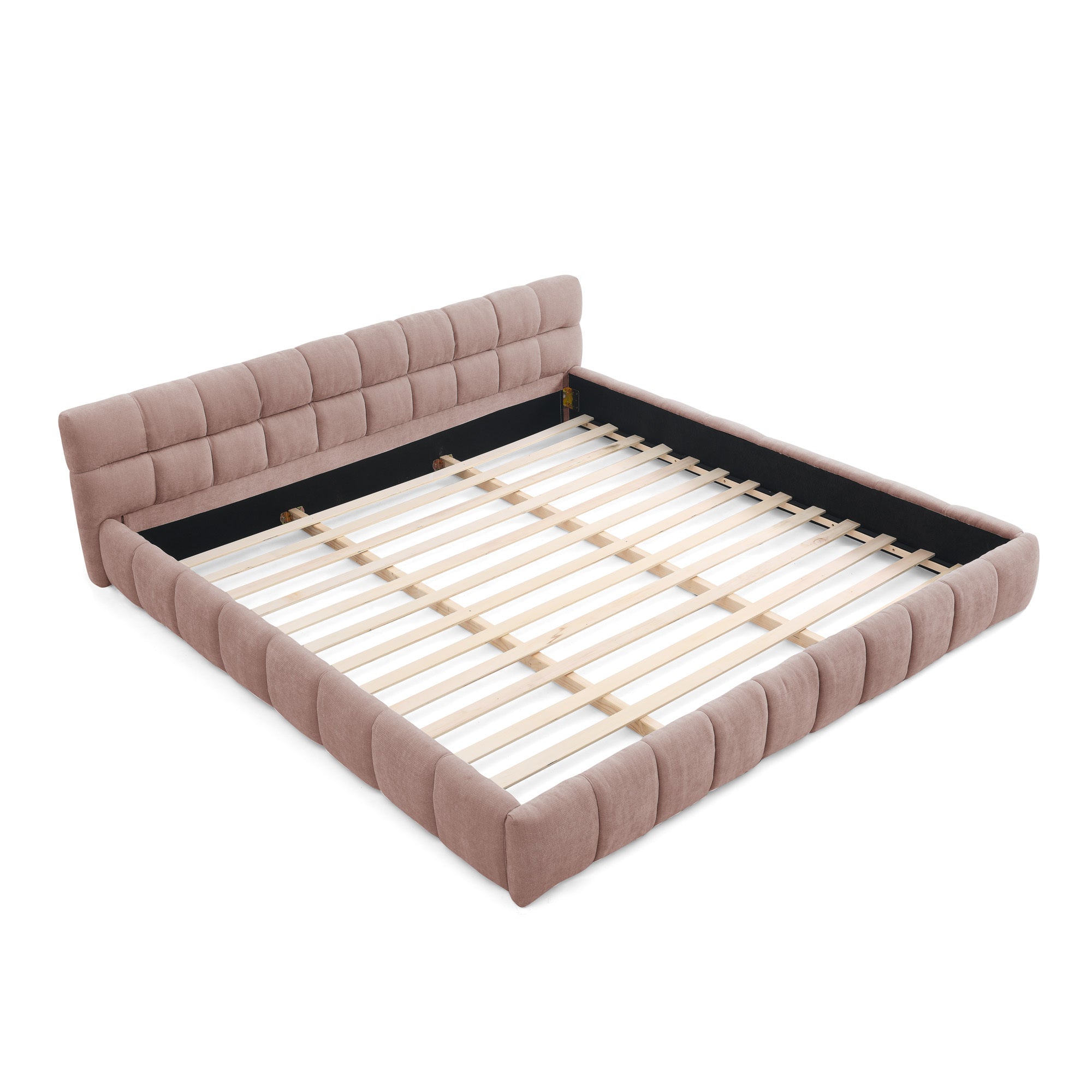 Pink chenille king bed frame on white background, opposite three-quarter angle