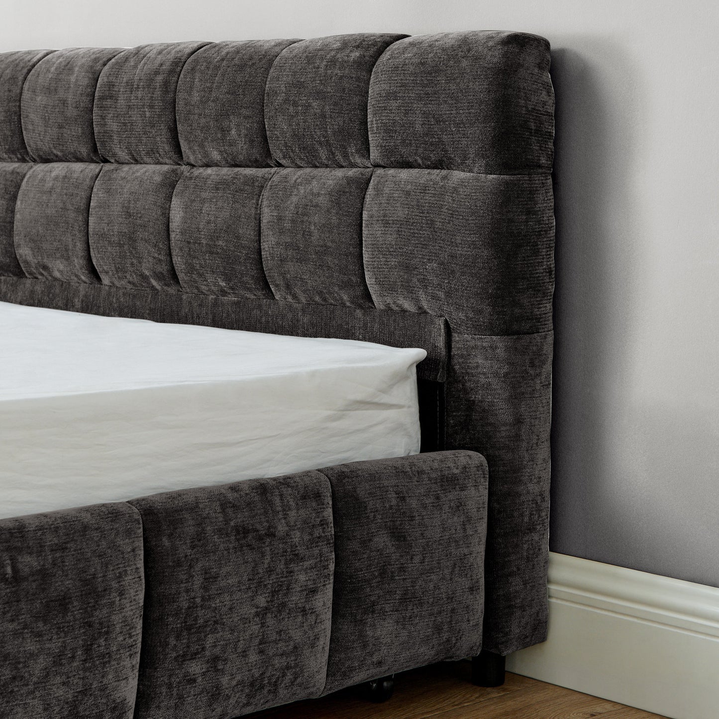 Close-up of caster wheel on storage drawer, California King bed frame
