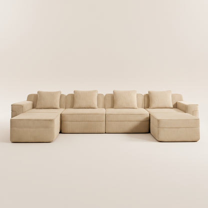studio photograph of the boneless couch in camel corduroy showing the modular sectional as well as deep seats comfortable fabric and plush pillows