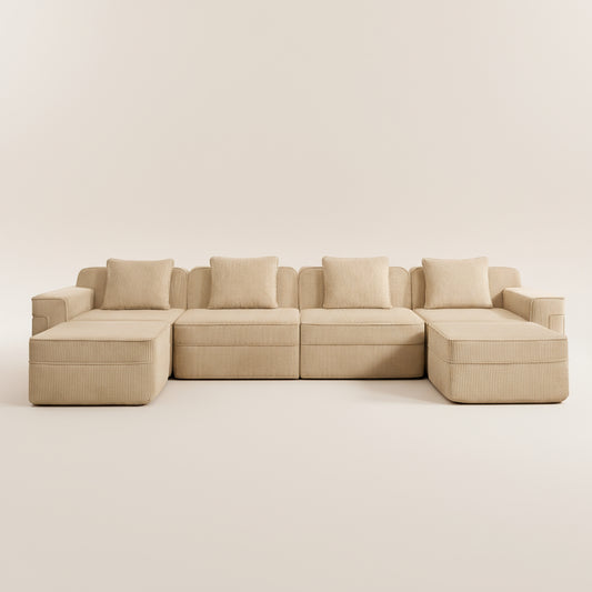 studio photograph of the boneless couch in camel corduroy showing the modular sectional as well as deep seats comfortable fabric and plush pillows