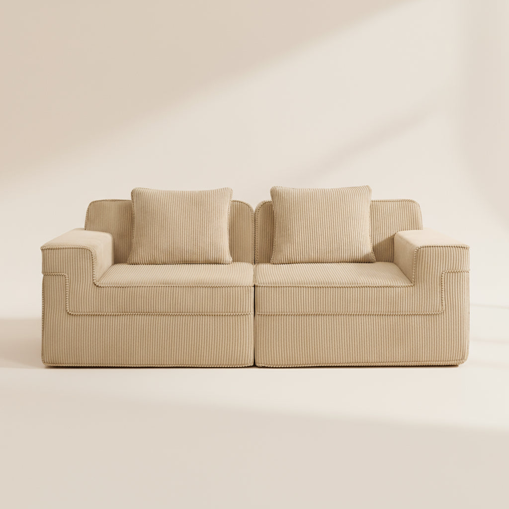 studio shot of the boneless couch in camel showing the rich corduroy upholstery and deep seated sectional