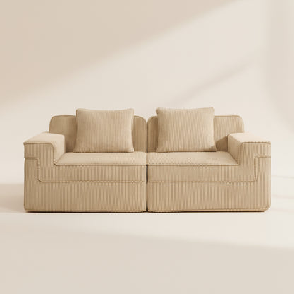 studio shot of the boneless couch in camel showing the rich corduroy upholstery and deep seated sectional