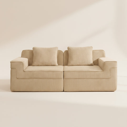 studio shot of the boneless couch in camel showing the rich corduroy upholstery and deep seated sectional