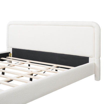 Close-up of curved headboard corner on white boucle king bed frame