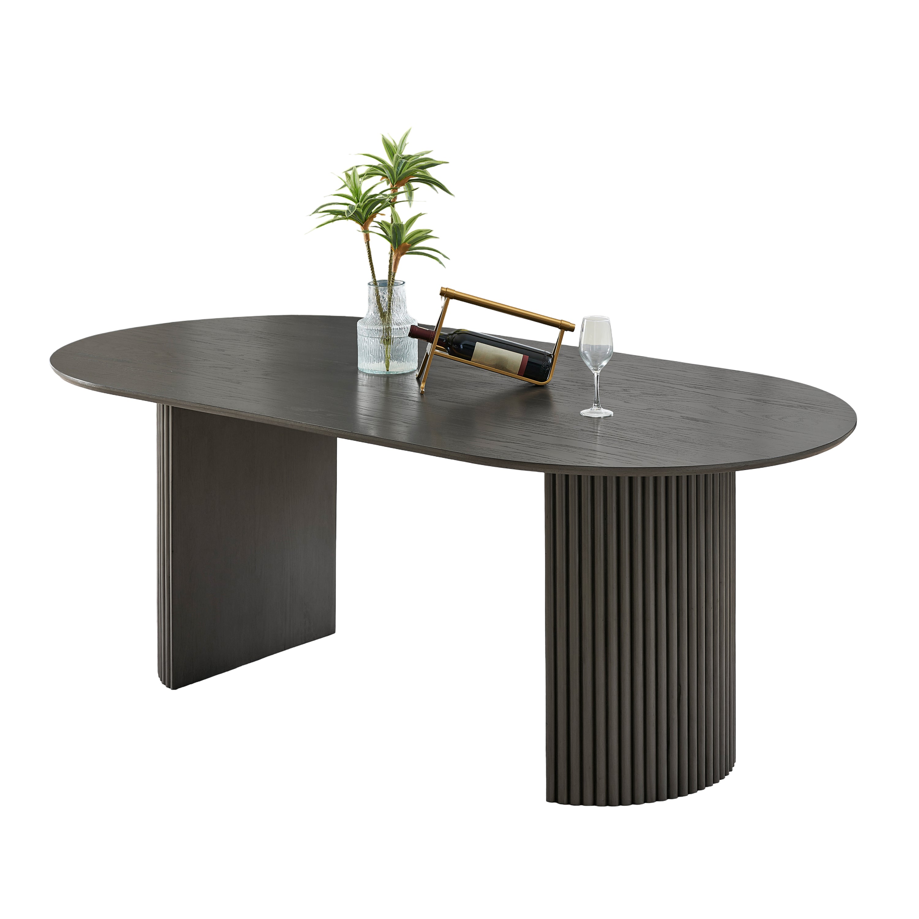 Gray oak oval dining table with dual pedestal base on a plain white background, three-quarter view