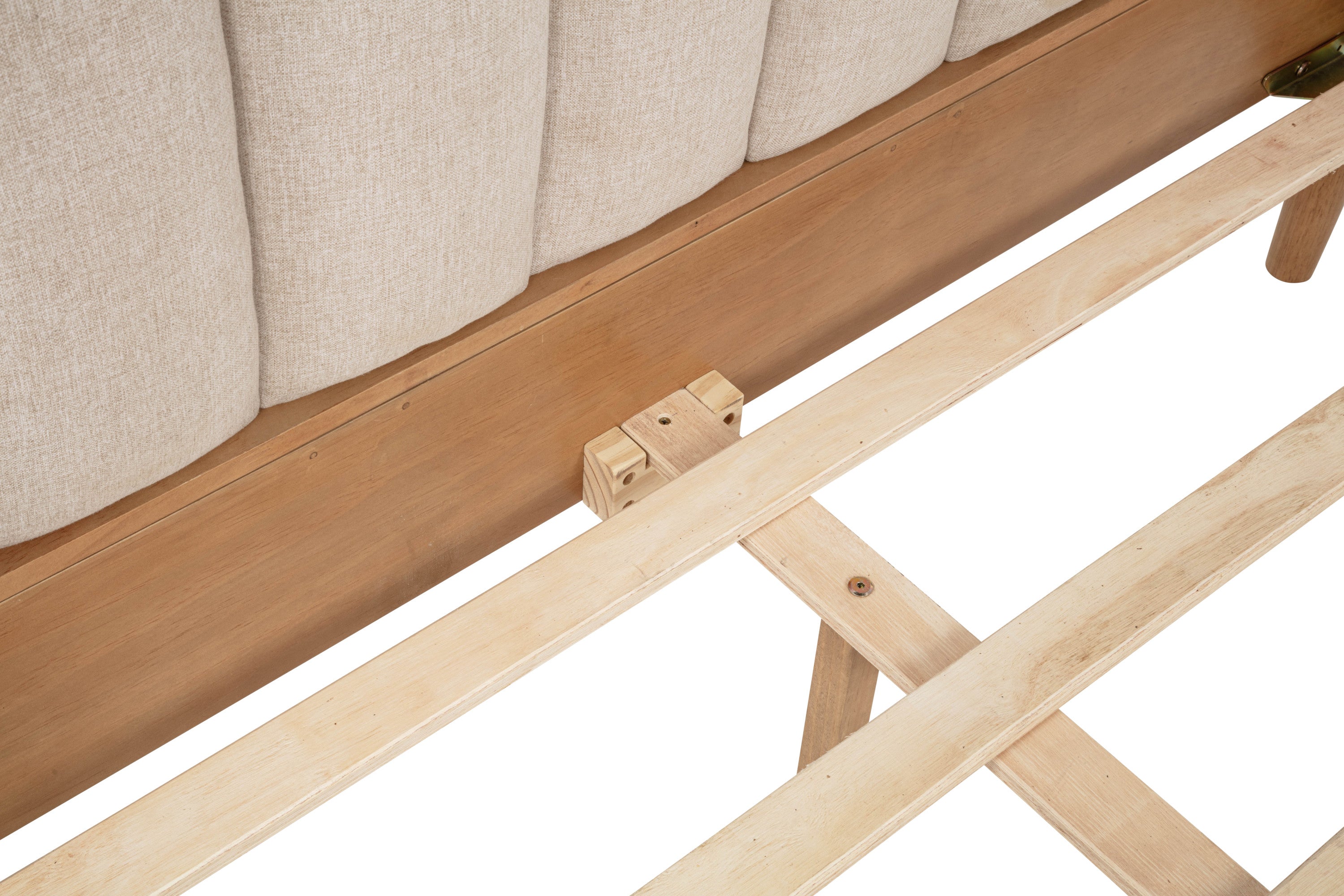 Close-up of a bolt-on side rail joint and central support foot beneath the piano-key headboard