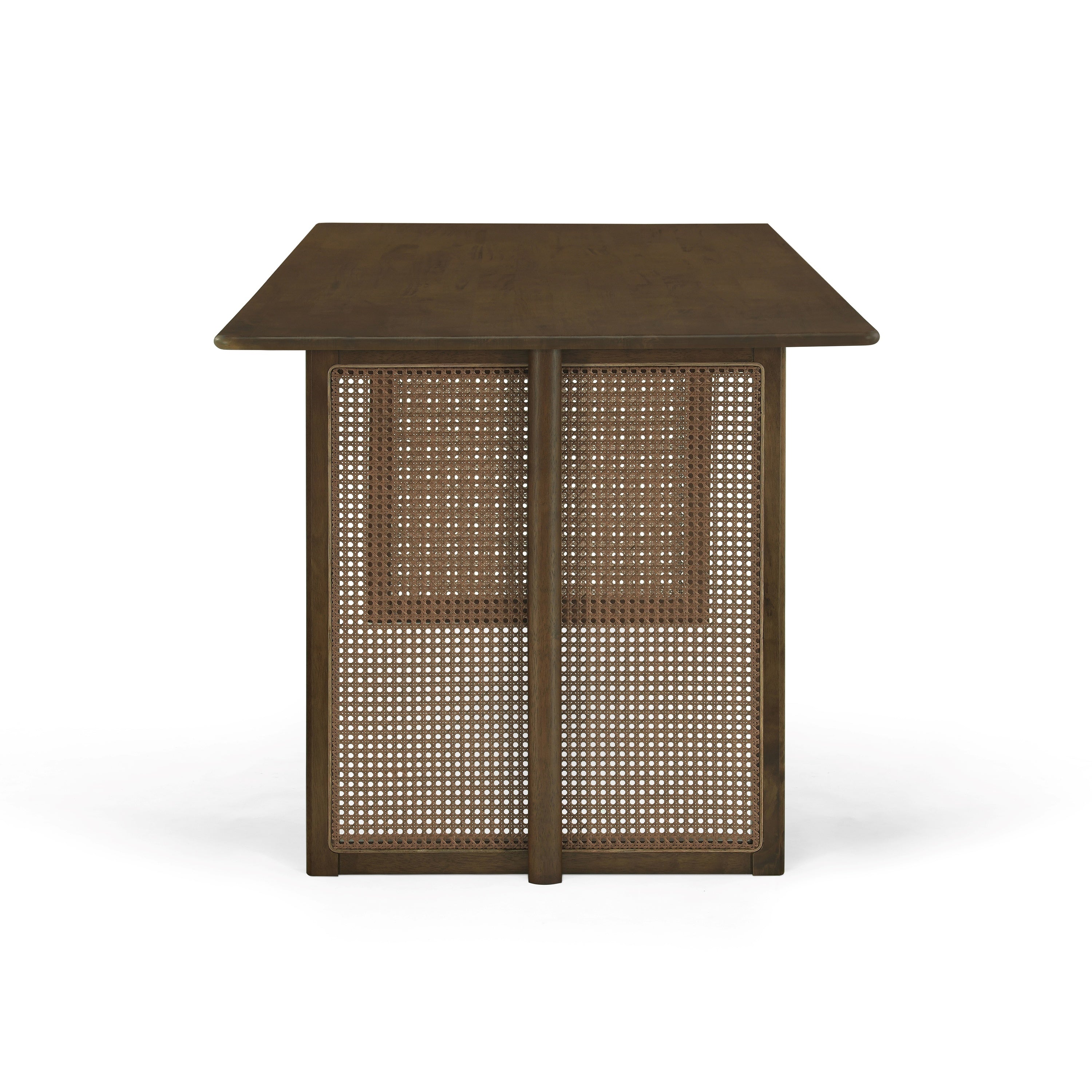 End view of the walnut dining table showing the twin woven cane panel legs, white background