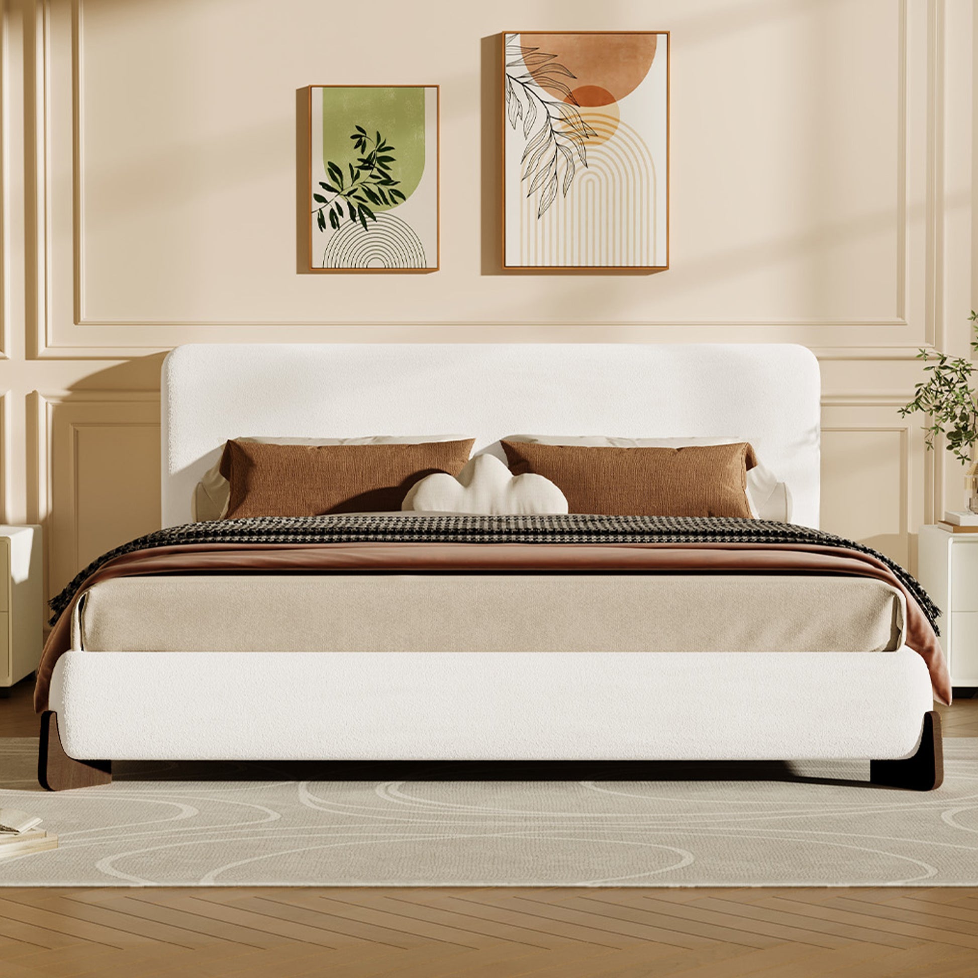 White bouclé king bed frame styled in a warm neutral bedroom