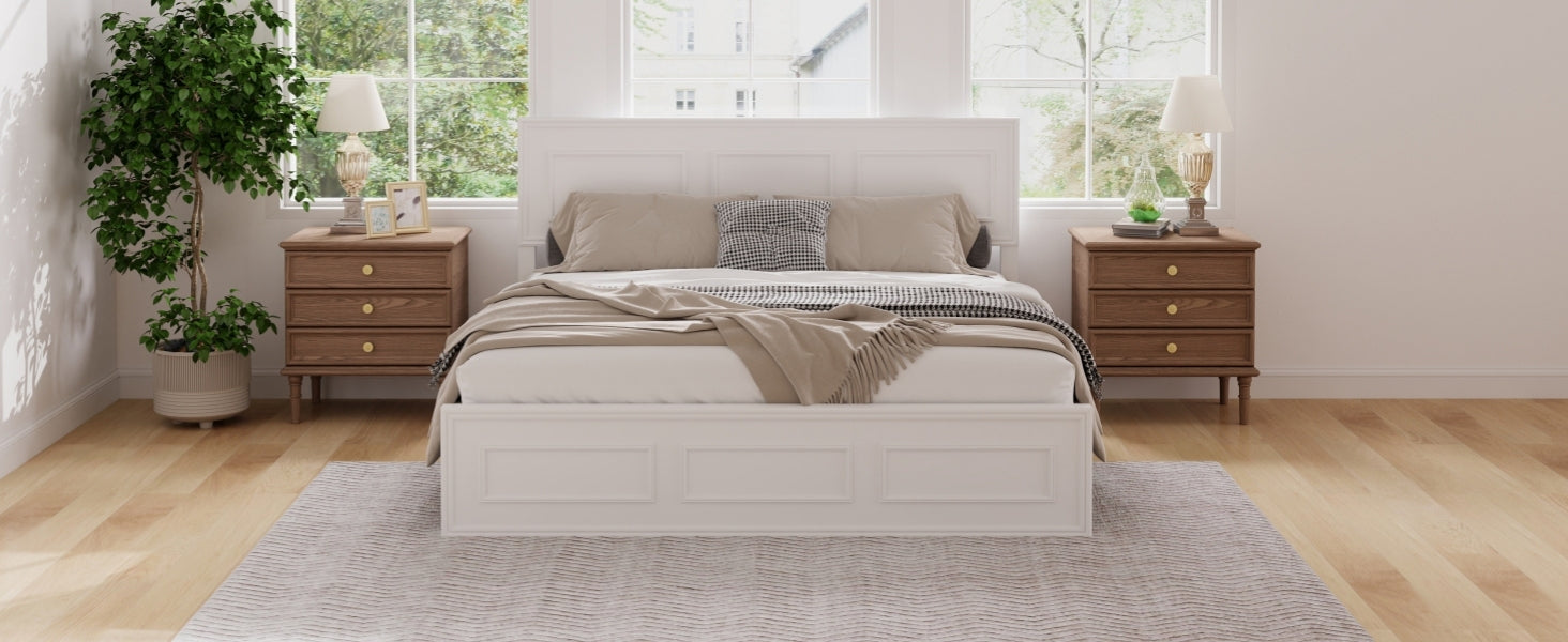Symmetrical view of the white queen panel bed between two windows with matching nightstands and lamps #Color_White