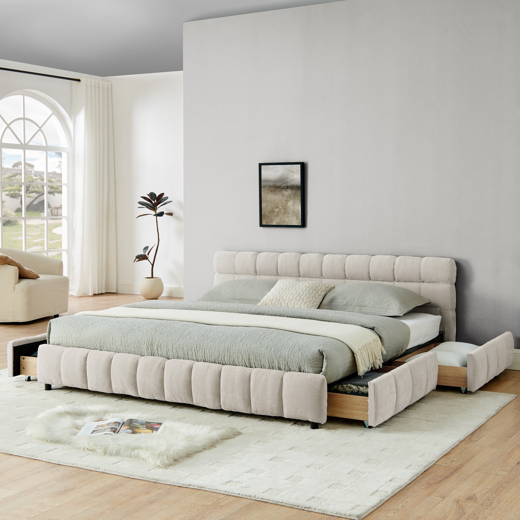 Wide bedroom shot of beige chenille king storage bed near window