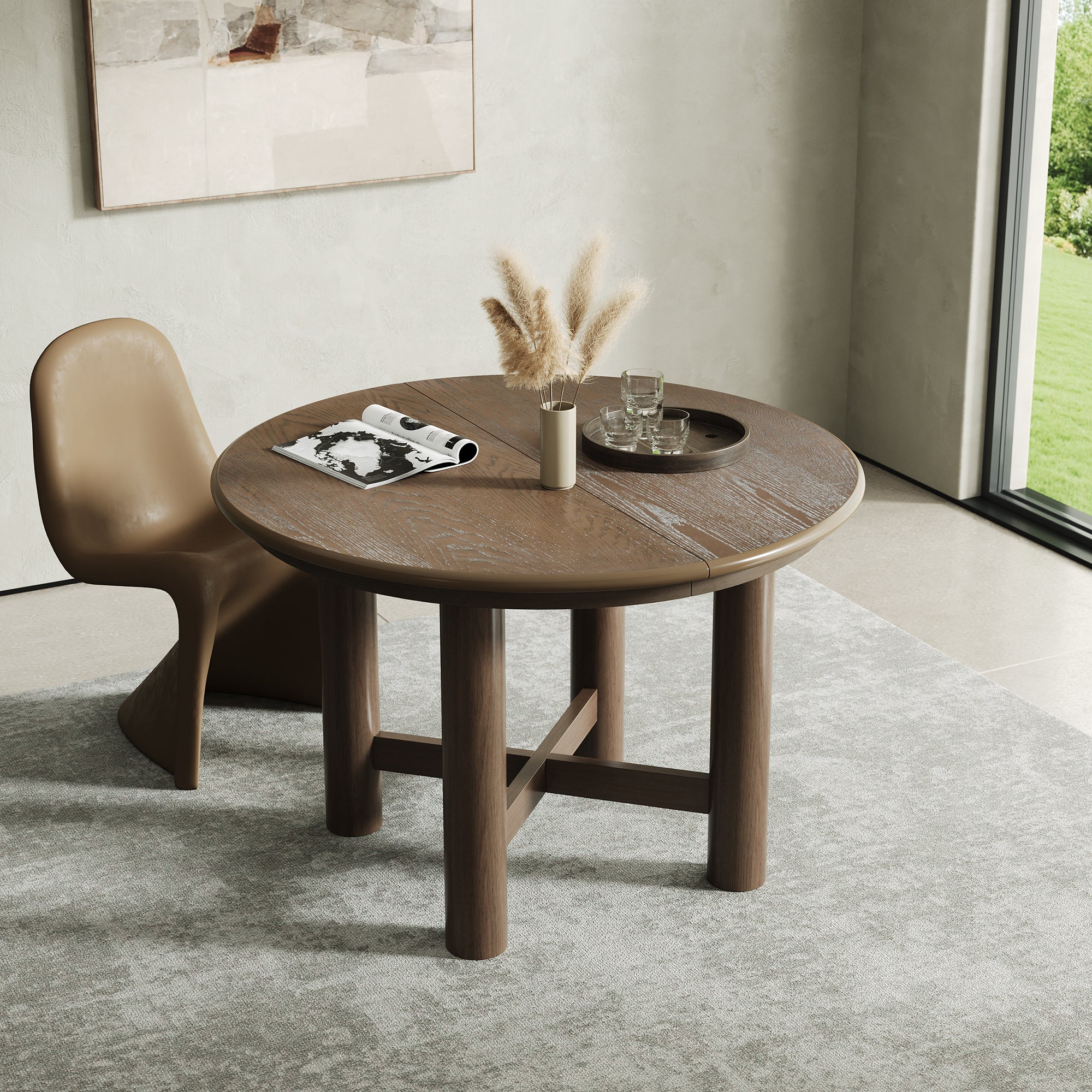 Round closed espresso oak-veneer table with a single tan chair
