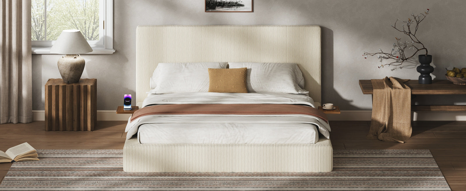 Cream corduroy queen platform bed styled in a neutral room, phone and cup on the sliding wood shelves