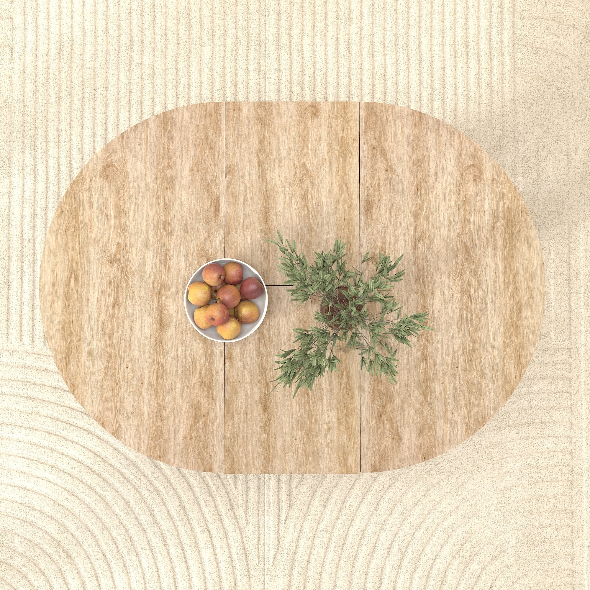 Overhead view of the oval oak tabletop on a woven rug with a fruit bowl and vase