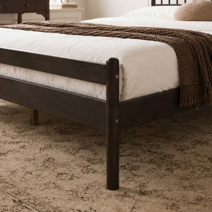 Close-up of footboard corner post and mattress edge