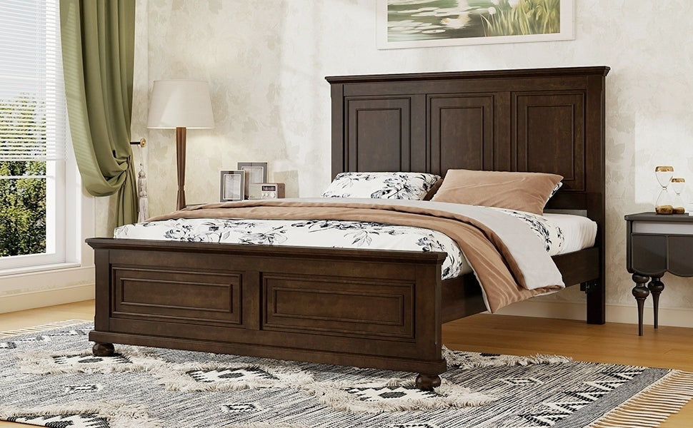 Angled foot view of the brown pine panel bed by a bright window with layered blush and white bedding