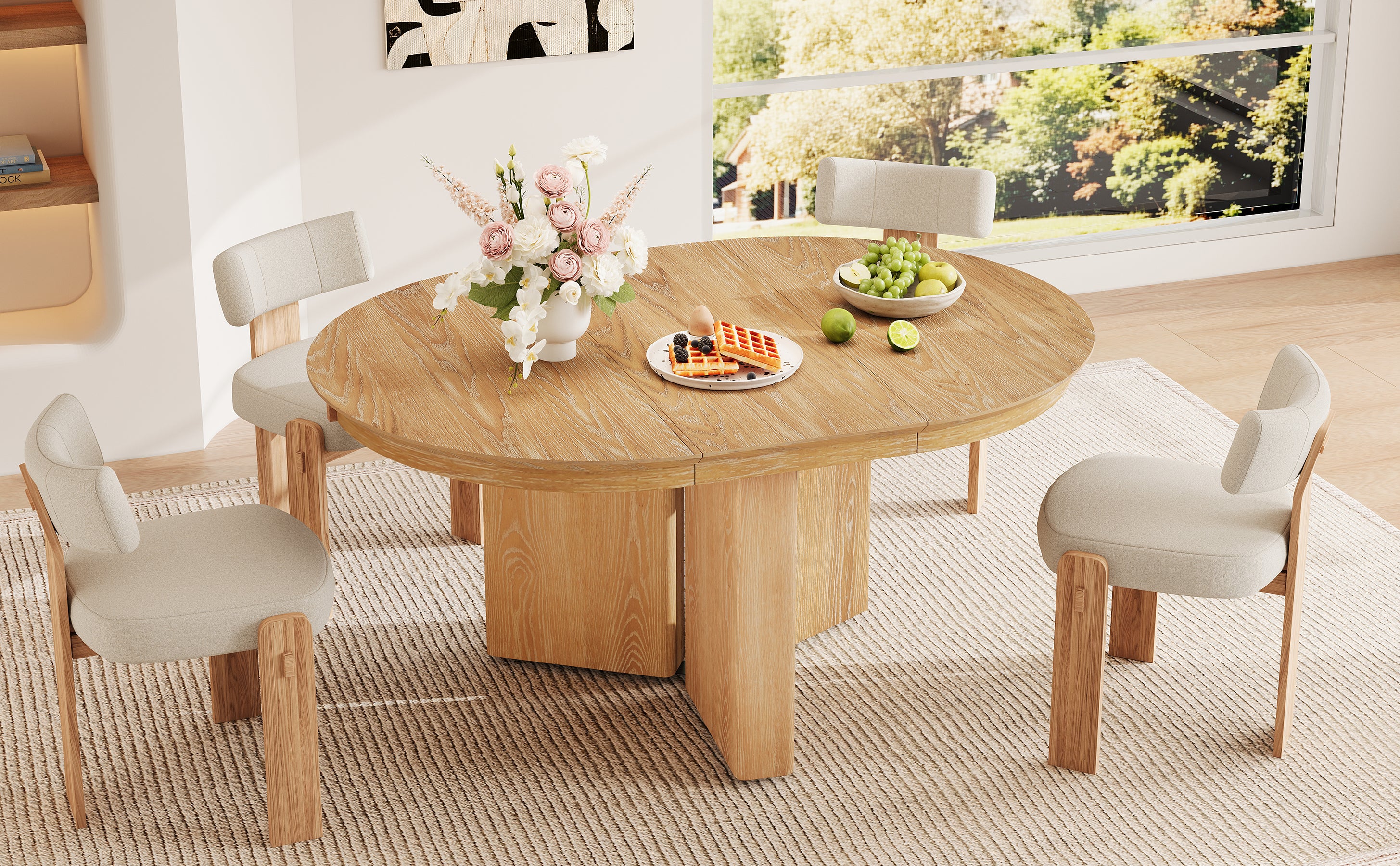 Round natural oak table with four cream chairs near lit shelving and a window