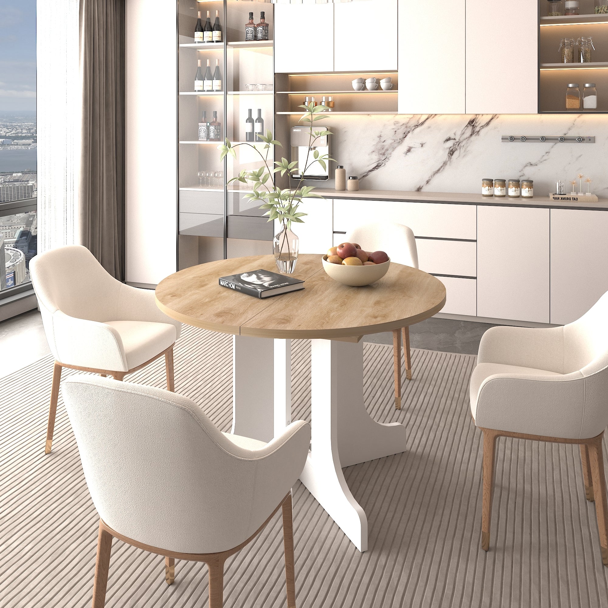 Round oak-top dining table with white base and cream chairs by a city-view kitchen