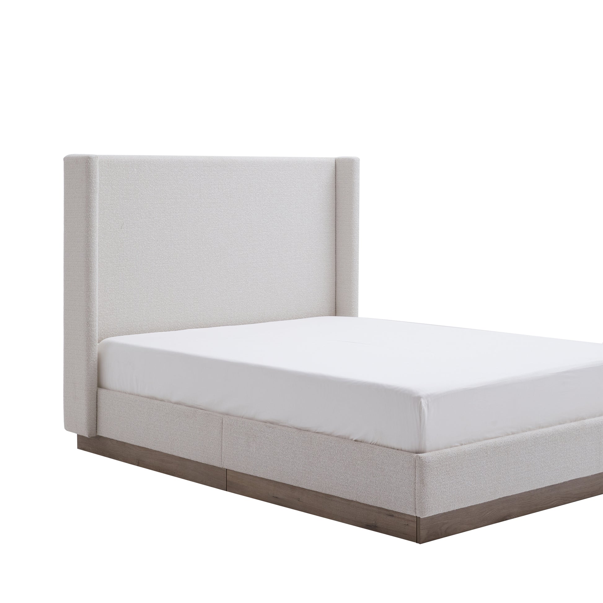 Side profile of cream wingback bed frame on white background