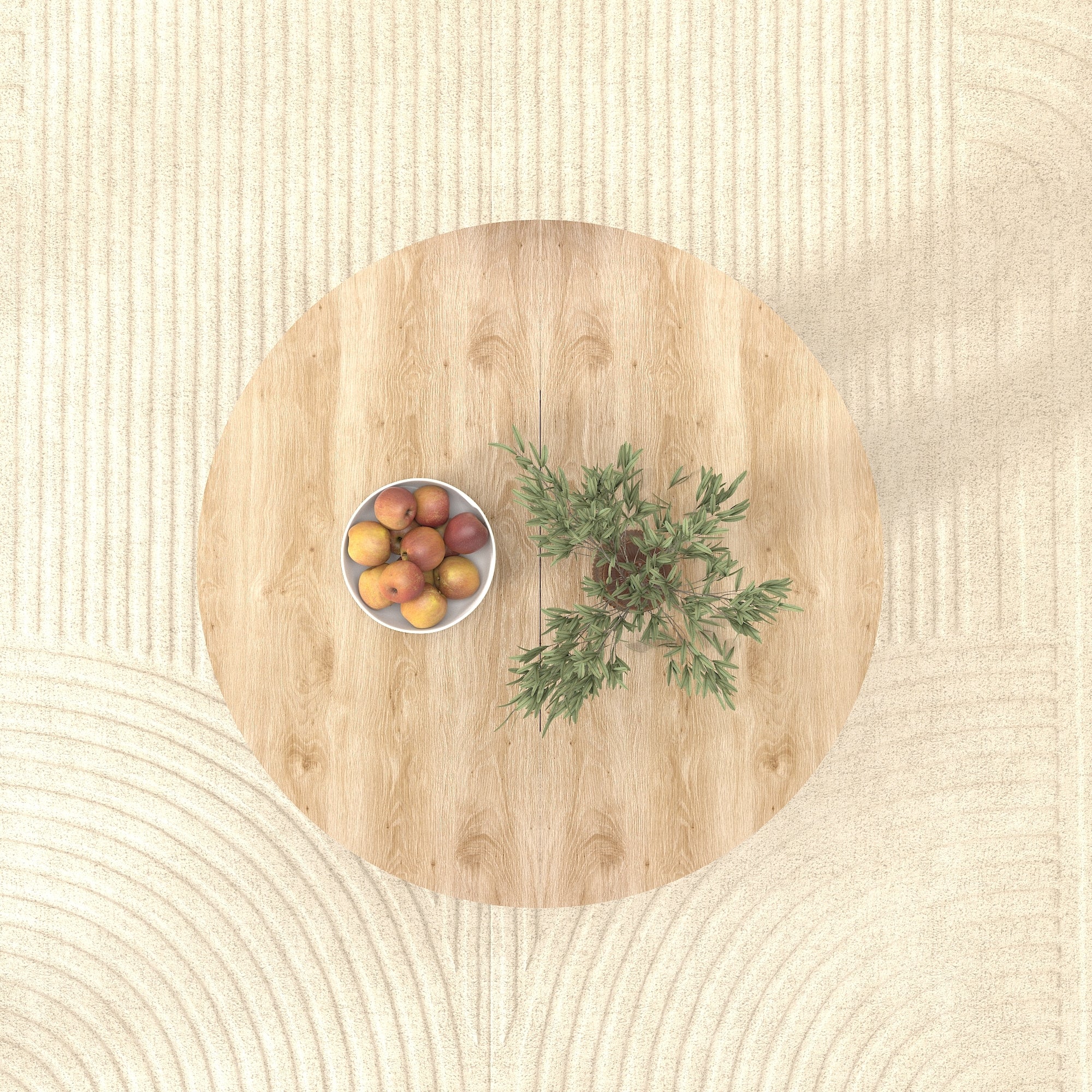 Overhead view of the round oak tabletop on a woven rug with a fruit bowl and vase