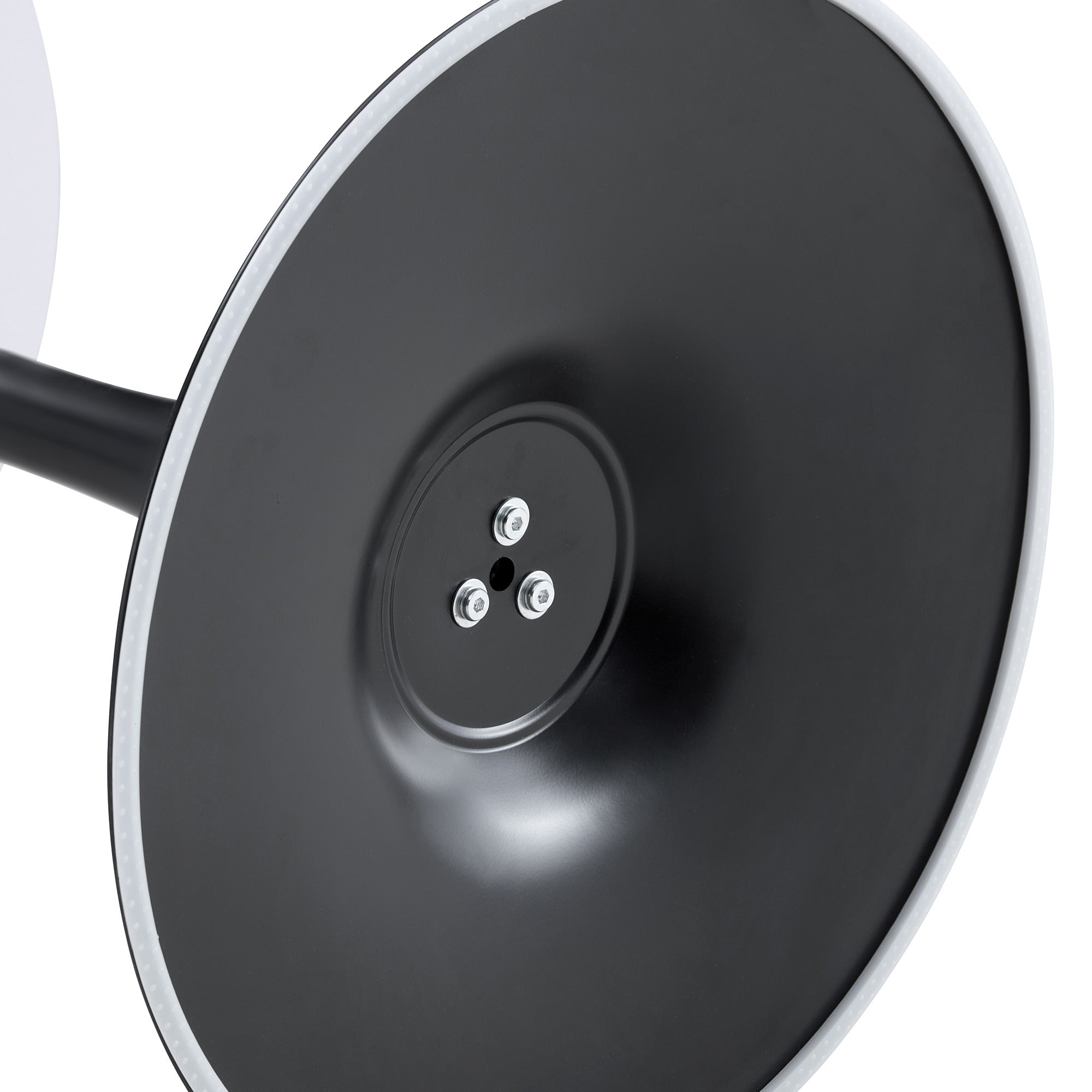 Close-up of the underside base plate of the bistro table showing the mounting bolts