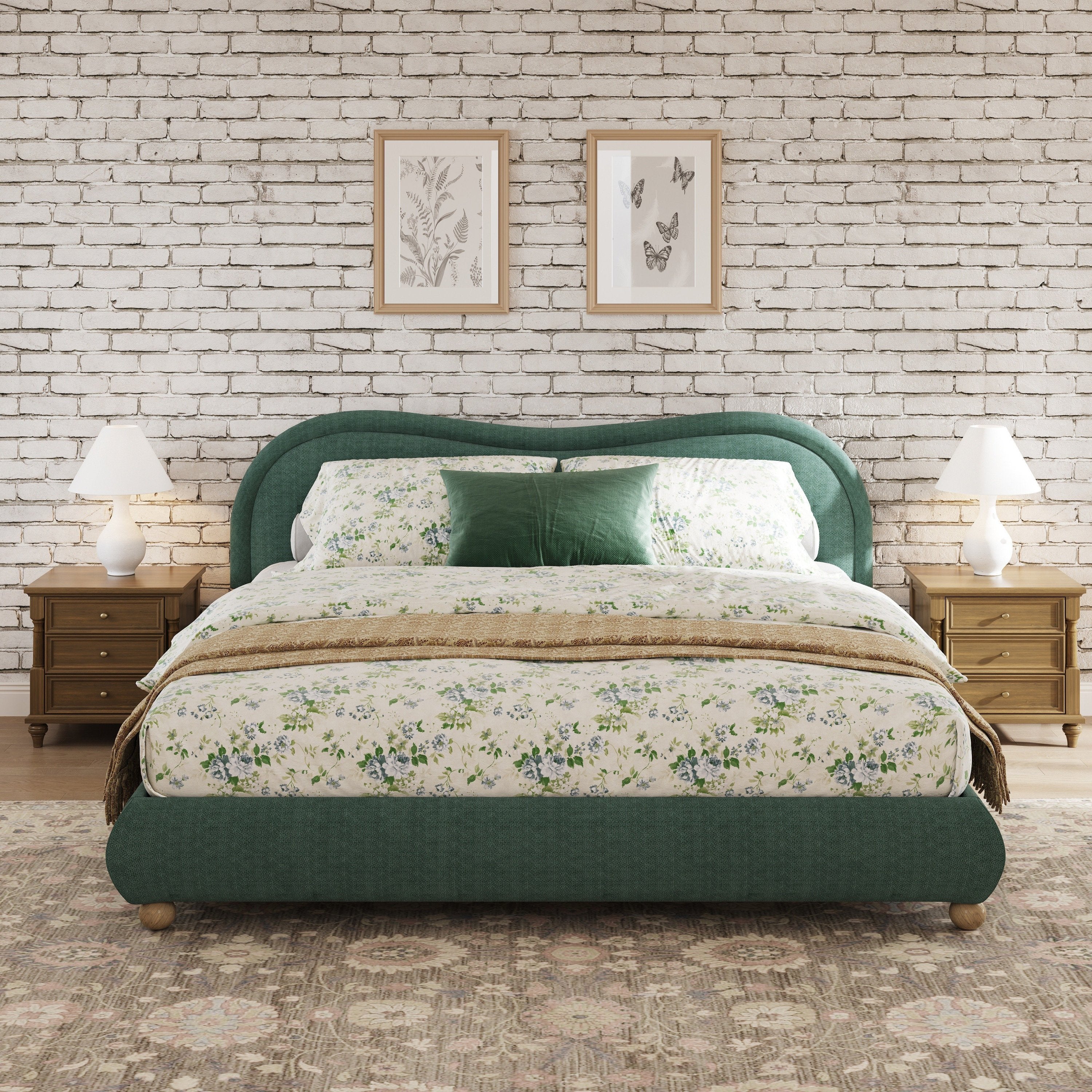 Olive green king bed in farmhouse-style bedroom with brick wall