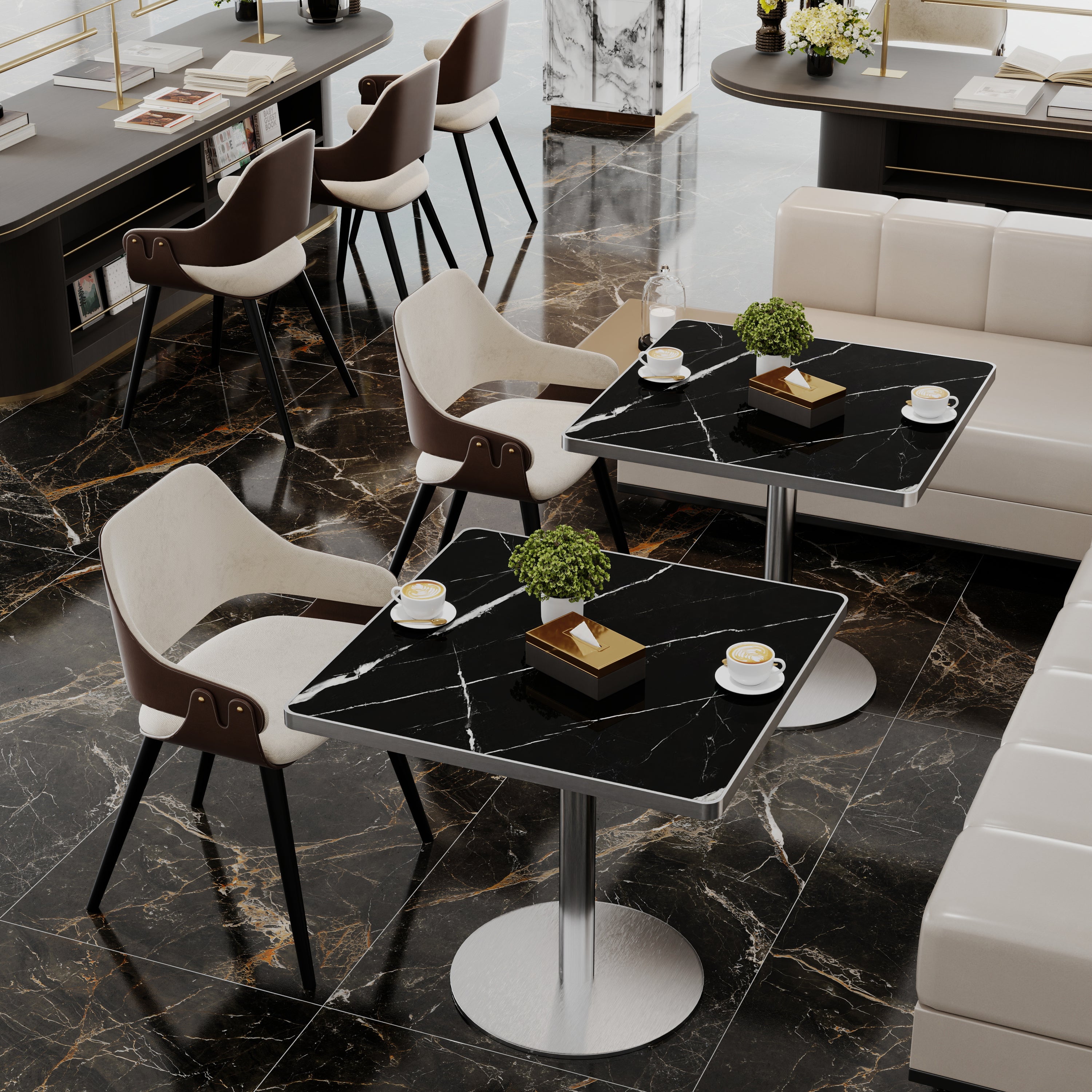 Black stone square tables with silver bases in a marble-floored cafe lounge