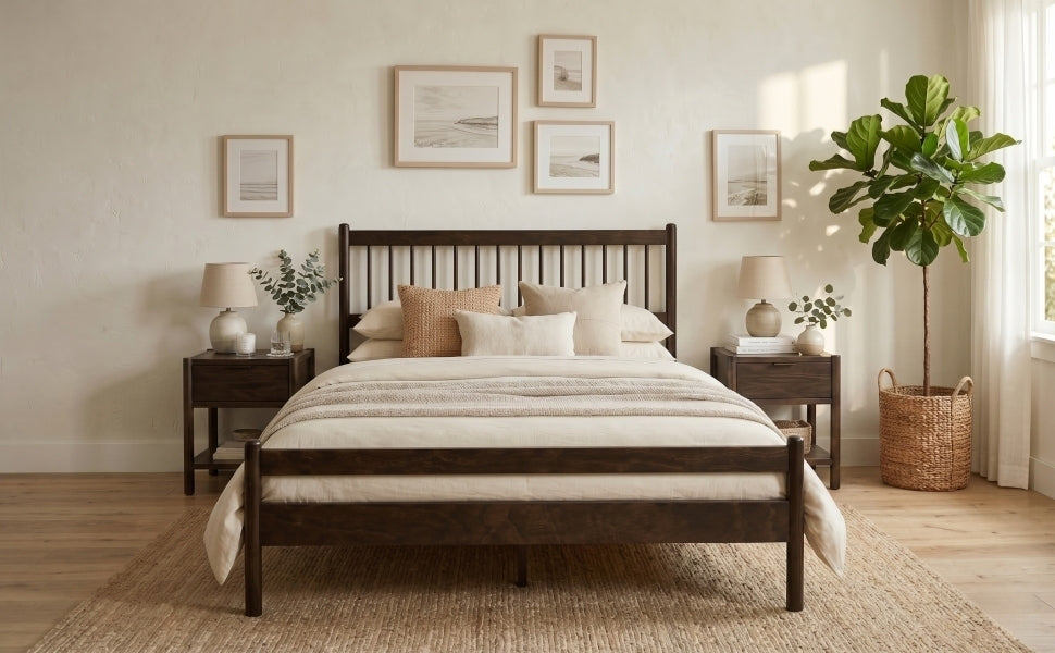 Wide front view of the brown solid wood queen bed styled with layered neutral bedding and matching nightstands #Color_Brown