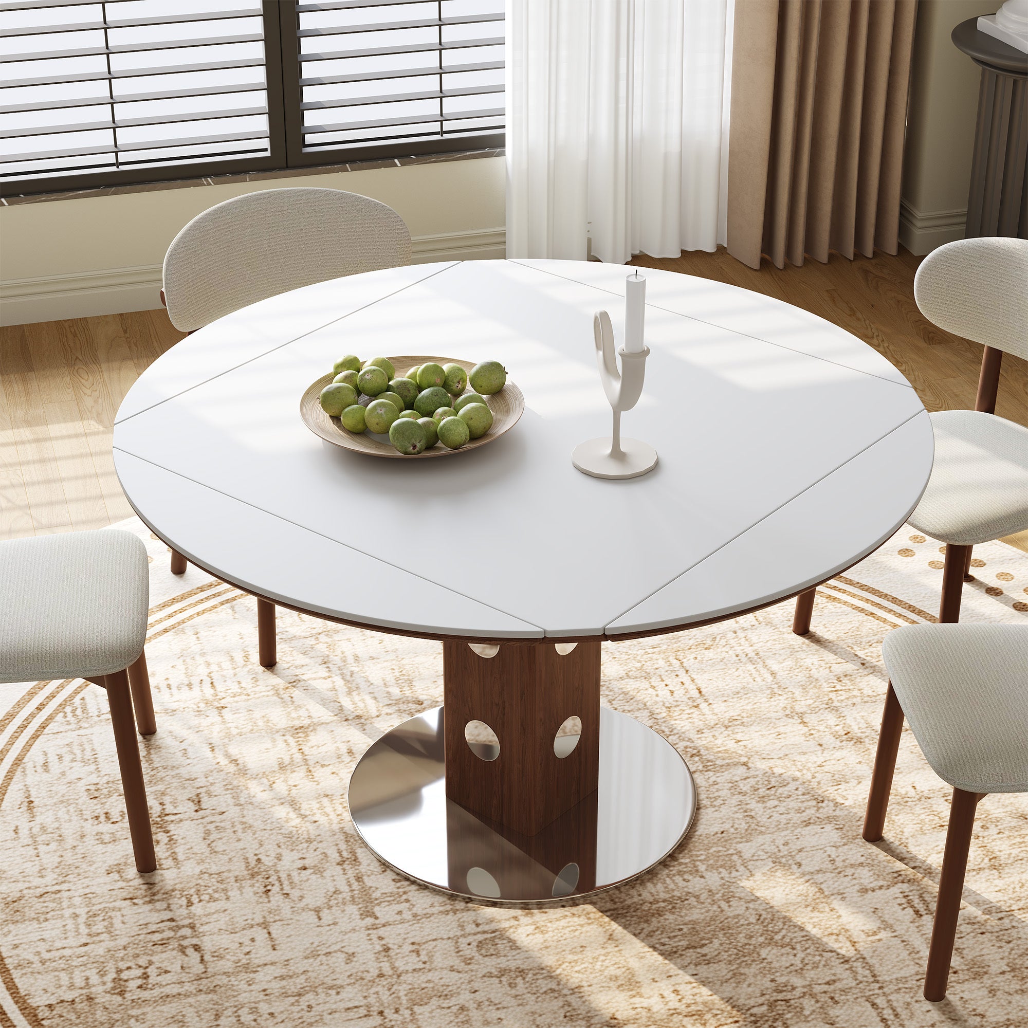 Overhead view of the white round table with pears and a candle by a window with blinds