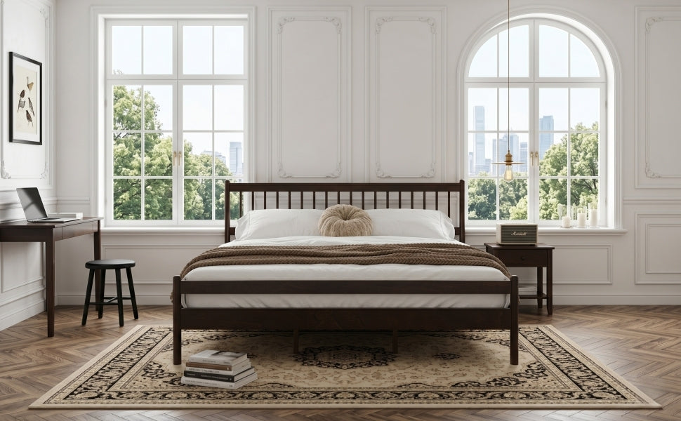 Brown pine king bed styled with throw blanket, wide angle