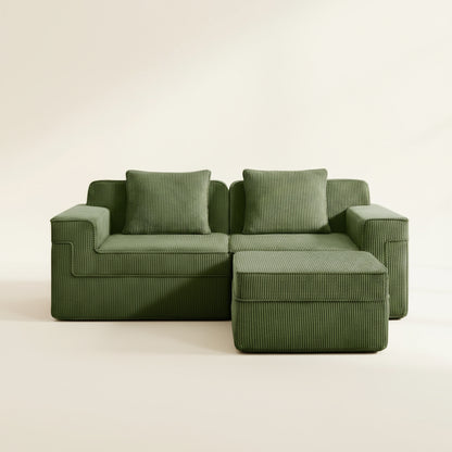 studio shot of the boneless couch in green with two seats and one ottoman showing the rich corduroy upholstery and colorful green sectional
