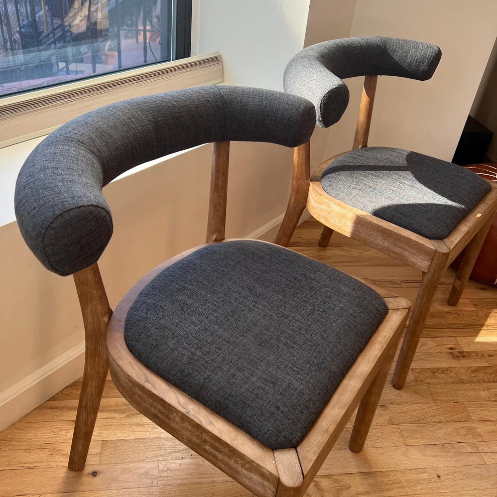 overview of navy upholstery and solid wood dining chairs for dining room table that is straight or circular