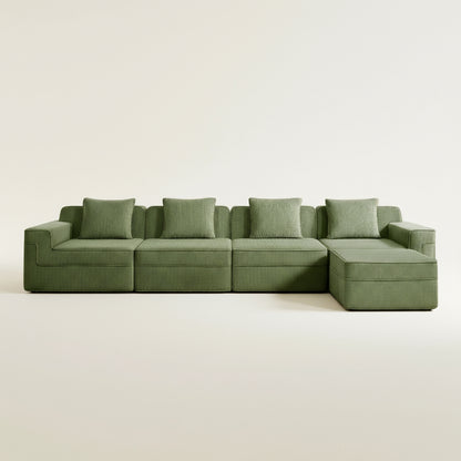 commercial photograph of the boneless couch in olive green showing the comfortable four seat layout with one ottoman as well as the rich corduroy upholstery and comfortable deep seats